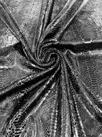 Load image into Gallery viewer, Black foil Snake design on a stretch velvet fabric-Sold by the yard.

