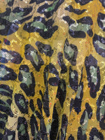 Load image into Gallery viewer, Gold leopard stretch lace with sequins all around 58” wide
