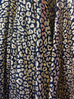Load image into Gallery viewer, leopard metallic foil on Nylon Spandex stretch Fabric 4 way stretch 58" wide
