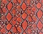 Load image into Gallery viewer, Orange Cobra Snake Embossed vinyl fabric sold by the yard 54” wide
