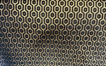 Load image into Gallery viewer, Gold honeycomb on black heavy chenille Upholstey fabric by the yard 54” wide
