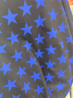 Load image into Gallery viewer, Blue stars black Spandex trixot 4 way stretch fabric 58" wide

