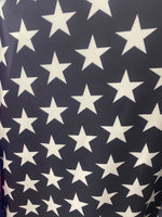 Load image into Gallery viewer, Beige stars black Spandex trixot 4 way stretch fabric 58" wide
