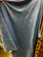 Load image into Gallery viewer, Green stars on black Spandex trixot 4 way stretch fabric 58" wide
