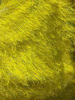 Load image into Gallery viewer, Yellow feather tinsel on mesh fabric per yard 60" wide
