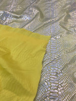 Load image into Gallery viewer, Yellow foil Snake design on a stretch spandex fabric-Sold by the yard.
