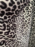 Load image into Gallery viewer, Black/White Leopard stretch velvet 58" wide
