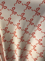 Load image into Gallery viewer, Red bows on ivory spandex 4  way  fabric by the yard
