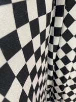 Load image into Gallery viewer, Black/White 1” square stretch velvet 58" wide
