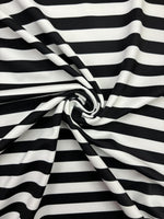 Load image into Gallery viewer, 4-Way Stretch Spandex Fabric, one inch black white stripe-by the yard 60 " Wide
