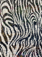 Load image into Gallery viewer, Zebra black and white stretch lace with sequins all around 58” wide
