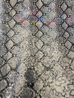 Load image into Gallery viewer, Snake black and white stretch lace with sequins all around 58” wide

