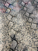 Load image into Gallery viewer, Snake black and white stretch lace with sequins all around 58” wide
