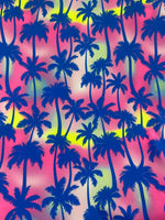 Load image into Gallery viewer, Neon Tropical Palm Tree Fabric – Vibrant Blue Silhouette on Pink, Sunset Ombre – Spandex Polyester, 60” Wide
