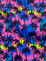 Load image into Gallery viewer, Dark Neon Tropical Palm Tree Fabric – Vibrant Blue Silhouette on Pink, Sunset Ombre – Spandex Polyester, 60” Wide
