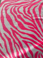 Load image into Gallery viewer, Hot pink on white zebra stretch velvet fabric 58" wide

