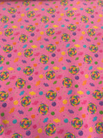 Load image into Gallery viewer, Candy Land Spandex Fabric – Pink Background with Colorful Lollipops &amp; Sweets – Stretch Fabric by the Yard

