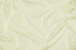 Load image into Gallery viewer, Ivory Nylon Spandex 4 Way Stretch Fabric by the Yard 58" wide Great for Swimwear, outfits, and any active wear
