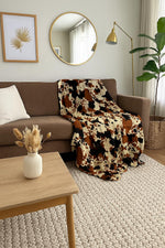 Load image into Gallery viewer, Brown and Black Cow Print Throw Blanket – Soft Faux Fur Farmhouse Decor, Cozy Western Blanket for Sofa or Bed 50" x 60"
