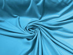Load image into Gallery viewer, Turquoise Premium Double Knit Scuba Fabric – Smooth, Stretchy, 60” Wide – Perfect for Dresses, Costumes &amp; Apparel
