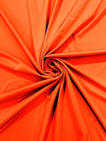 Load image into Gallery viewer, Neon orange Milliskin Nylon Spandex Stretch Dull Tricot Medium Weight Fabric for Apparel/4 Way stretch
