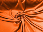 Load image into Gallery viewer, Orange Premium Double Knit Scuba Fabric – Smooth, Stretchy, 60” Wide – Perfect for Dresses, Costumes &amp; Apparel
