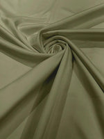 Load image into Gallery viewer, Sage green Stretch Lamour Satin Fabric – Shiny Metallic Look, 4-Way Stretch for Dancewear, Costumes, Activewear &amp; Apparel
