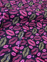 Load image into Gallery viewer, Wild Kiss Leopard Lips Satin Spandex Fabric – Pink &amp; Gold Lip Print on Black Stretch Fabric – Rave, Bodysuit, Dancewear, Leggings Material
