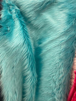 Load image into Gallery viewer, Faux fur, Aqua shaggy fabric per yard 60 inches wide
