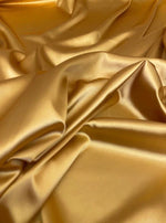 Load image into Gallery viewer, Gold bridal shiny satin polyester fabric  60" wide
