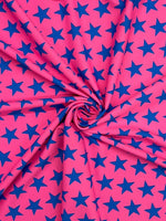 Load image into Gallery viewer, Blacklight Reactive Pink and Blue Star Printed Spandex 4 way stretch
