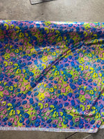 Load image into Gallery viewer, Holographic Rainbow Leopard Print Fabric — Iridescent Spandex Stretch, Sold by the Yard, Festival &amp; Cosplay Fabric, Rave Wear, Dance Costume

