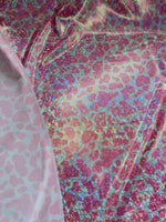 Load image into Gallery viewer, Holographic Pink Mini Cow Print Spandex Fabric — Iridescent Foil Stretch, Sold by the Yard, Rave &amp; Festival Fabric, Dance Costume, Cosplay
