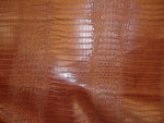 Load image into Gallery viewer, Vinyl Faux Leather Crocodile Nile Mocha embossed Faux vinyl fake upholstery fabric sold per yard 54" Wide
