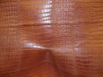 Load image into Gallery viewer, Vinyl Faux Leather Crocodile Nile Mocha embossed Faux vinyl fake upholstery fabric sold per yard 55" Wide

